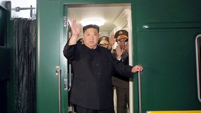 North Korean leader Kim Jong Un waves from a private train as he departs Pyongyang, North Korea, to visit Russia, September 10, 2023, in this image released by North Korea's Korean Central News Agency | KCNA via Reuters