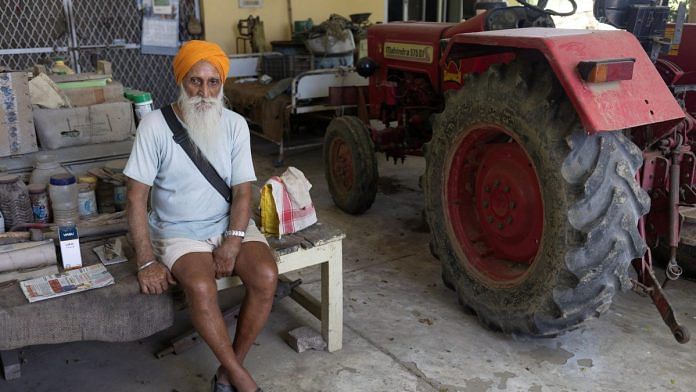 Himmat Singh Nijjar, 79, uncle of Sikh separatist leader Hardeep Singh Nijjar, sits inside his house after an interview with Reuters at village Bharsingpura, in Jalandhar district of the northern state of Punjab, India | Reuters