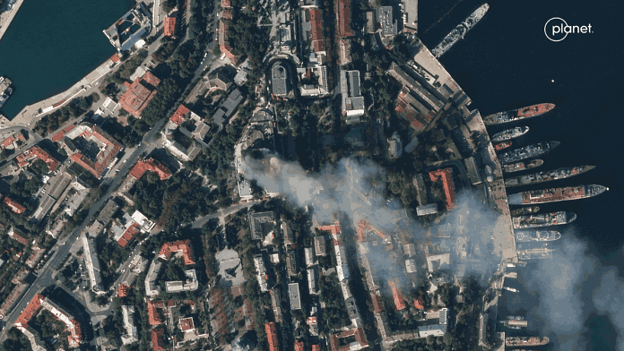 A satellite image shows smoke billowing from a Russian Black Sea Navy HQ after a missile strike, in Sevastopol, Crimea, Friday | Planet Labs PBC | Reuters