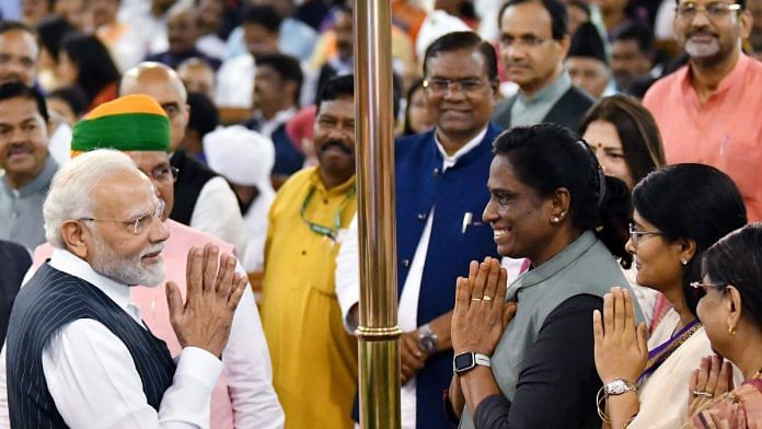 Prime Minister Narendra Modi meets Union Minister of State for Commerce and Industry Anupriya Patel, Rajya Sabha MP PT Usha and other Parliamentarians at the Central Hall of the old Parliament building ahead of the Parliament Special Session, in New Delhi on Tuesday.