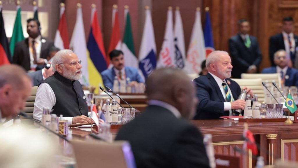 PM Narendra Modi with fellow world leaders at a G20 session at the Bharat Mandapam in New Delhi Saturday | X/@NarendraModi
