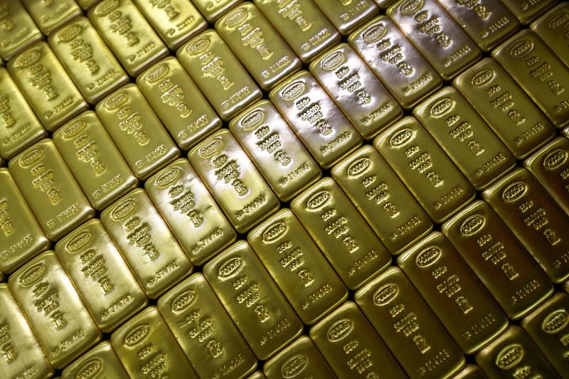 Gold Retreats As Growth Risks Drive Safe-haven Bids To US Dollar ...