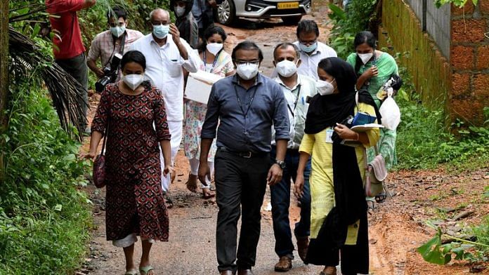Members of a medical team from Kozhikode Medical College carry areca nut and guava fruit samples to conduct tests for Nipah virus in Maruthonkara village in Kozhikode district, Kerala, India, September 13, 2023 | Reuters