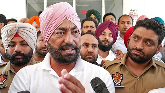 Congress leader Sukhpal Singh Khaira speaks to the media outside a police station in Fazilka Thursday | ANI
