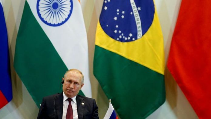 Russia's President Vladimir Putin attends the Dialogue with BRICS Business Council & New Development Bank during the BRICS summit in Brasilia, Brazil November 14, 2019/Reuters