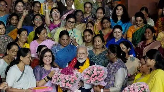 Prime Minister Narendra Modi with Union minister Smriti Irani and women MPs after passage of the women's reservation Bill | Photo: PTI
