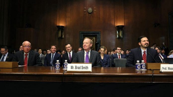 Microsoft President Brad Smith, Nvidia's chief scientist William Dally, and Professor Woodrow Hartzog wait to testify before a Senate Judiciary Privacy, Technology, and the Law Subcommittee hearing on 