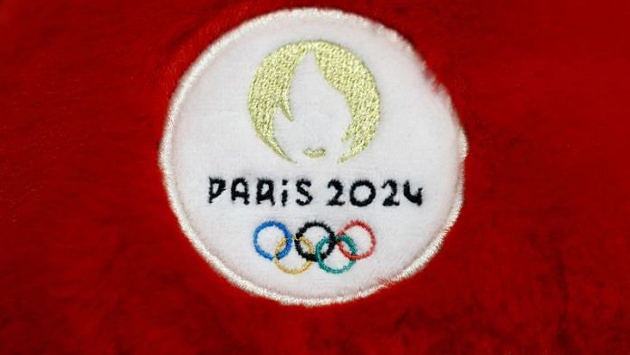 The logo of the Paris 2024 Olympics and Paralympics Games is seen on an official toy mascot at the Doudou et Compagnie factory in La Guerche-de-Bretagne near Rennes in Brittany, France, April 12, 2023 | Reuters