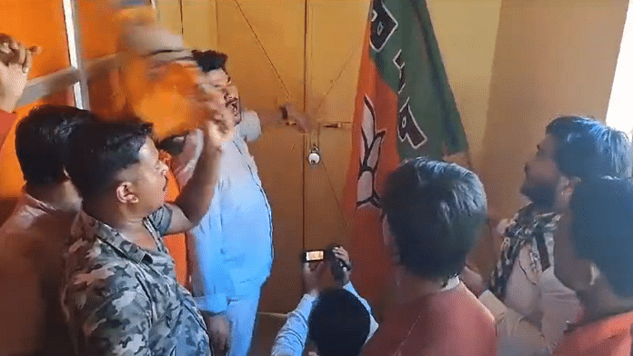 Screengrab of BJP workers locking up Union Minister Dr Subhas Sarkar inside the party office in the Bankura constituency | Video: X@@AITCofficial