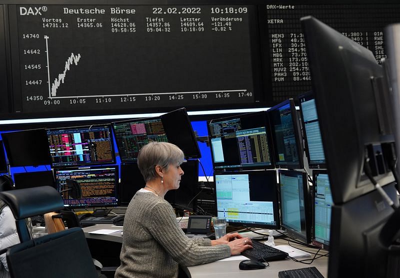 Stocks slide as central banks' hawkish tilt unnerves markets