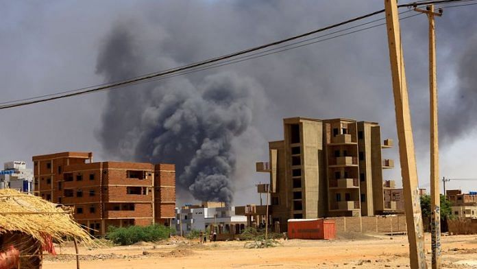 Smoke rises above buildings after an aerial bombardment during clashes between the paramilitary Rapid Support Forces and the army, in Khartoum North, Sudan, May 1, 2023/Reuters