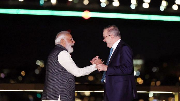 Prime Minister Narendra Modi exchanges greetings with Australian PM Anthony Albanese during his visit to the Sydney Harbour, in Sydney in May 2023 | ANI