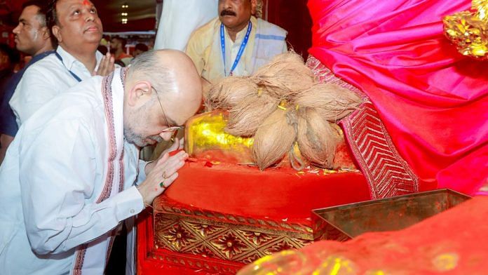 Union Home Minister Amit Shah offers prayers to Lord Ganesha during Ganesh Chaturthi festivities at Lalbaugcha Raja in Mumbai on Saturday | ANI