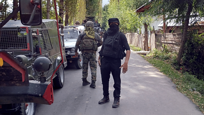 Security personnel cordon off the area after army men were killed in a gunfight with terrorists at Kokernag area in Anantnag district Thursday | PTI