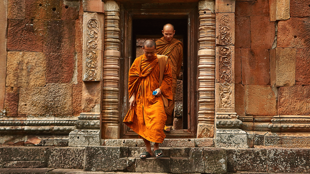 Representational photo of Buddhist monks in orange robe | Pexels