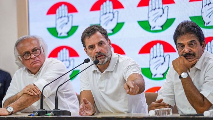 Congress leader Rahul Gandhi with party leaders Jairam Ramesh and K.C. Venugopal at a press conference at AICC headquarters, in New Delhi | PTI photo
