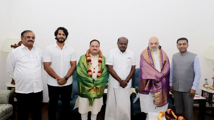 Former Karnataka CM and JD(S) leader H.D. Kumaraswamy with Home Minister Amit Shah and BJP President JP Nadda | Twitter/@JPNadda