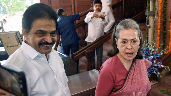 File photo of Congress Rajya Sabha MP K C Venugopal with former Congress president Sonia Gandhi at the old Parliament building | ANI