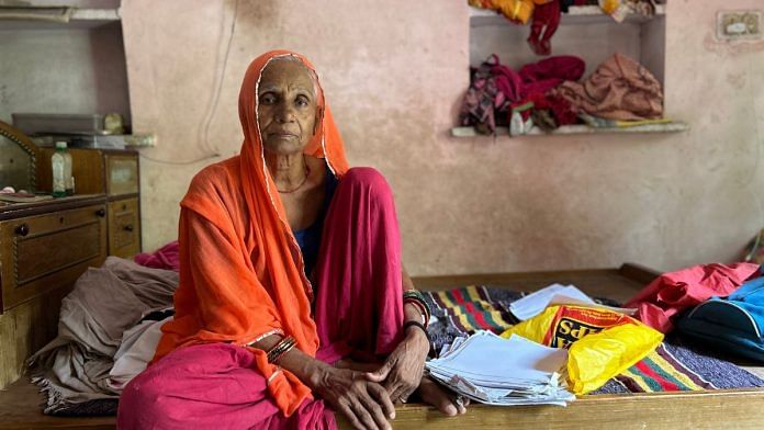 Bhanwari Devi with a bundle of files. Scores of young, old, and middle-aged women from all over Rajasthan have flocked to Bhateri village, searching for Bhanwari Devi. She says that she helped and guided most of the women to get justice. | Jyoti Yadav | ThePrint
