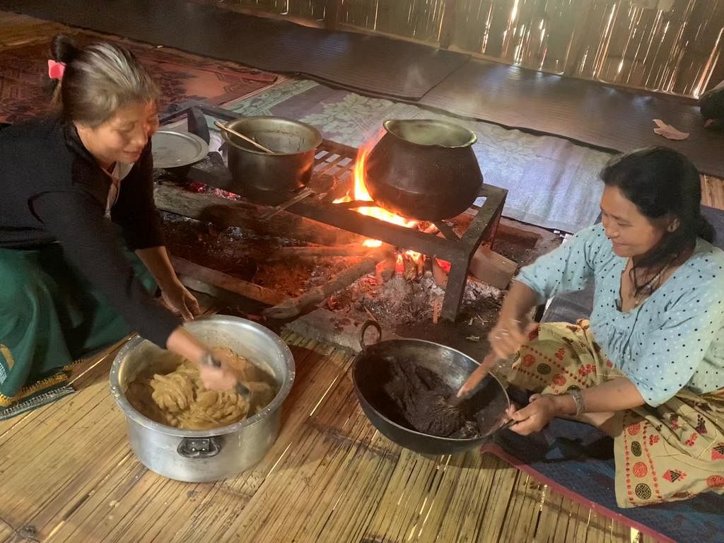 Nyishi women preparing Rangbang, a traditional sticky dish made with Sago palm flour or rice flour | Karishma Hasnat, ThePrint