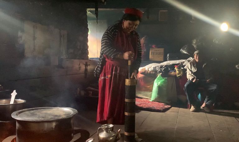 Monpa lady making traditional Cha-Za (salt tea from Yak milk) at Lumpo village, Zemithang | Karishma Hasnat, ThePrint