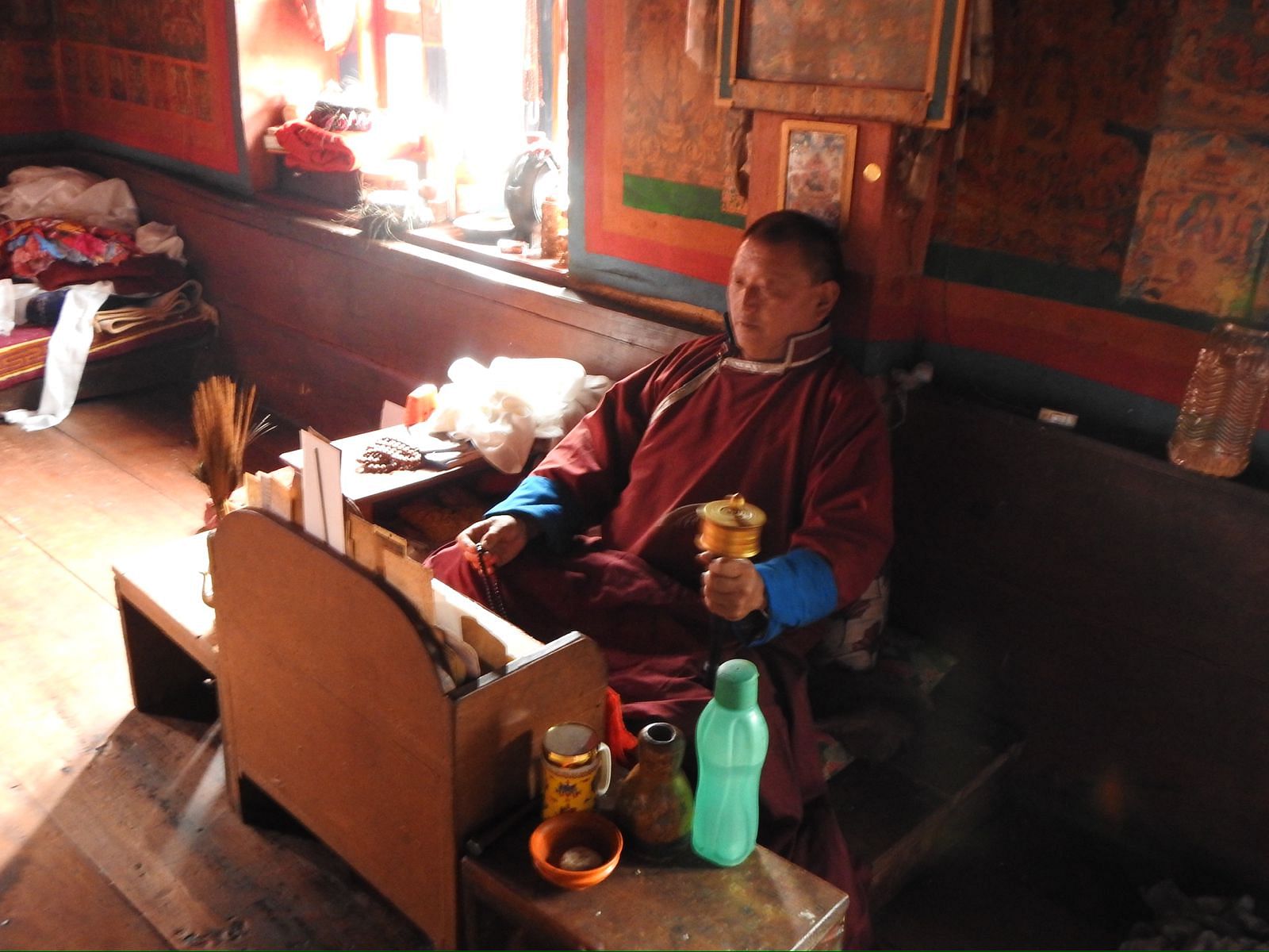 Nawang Chhota, Gaon Burah (Village head) of Lumpo village, Zemithang in the prayer room | Karishma Hasnat, ThePrint