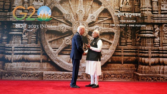 Prime Minister Narendra Modi exchanges greetings with US President Joe Biden during the G20 Leaders' Summit, at the Bharat Mandapam in New Delhi on Saturday | ANI