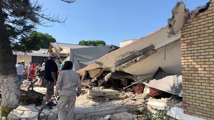 Members of a rescue team and people work at a site where a church roof collapsed during Sunday mass in Ciudad Madero, in Tamaulipas state, Mexico in this handout picture distributed to Reuters on October 1, 2023. Secretaria de Seguridad Publica Tamaulipas/Handout via REUTERS