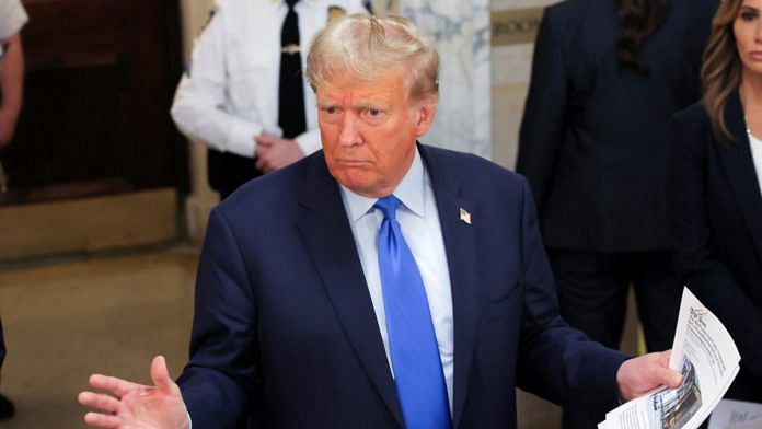 Former U.S. President Donald Trump gestures as he makes a statement to the media outside the court room at a Manhattan courthouse, during the trial of himself, his adult sons, the Trump Organization and others in a civil fraud case brought by state Attorney General Letitia James, in New York City, U.S. | Reuters