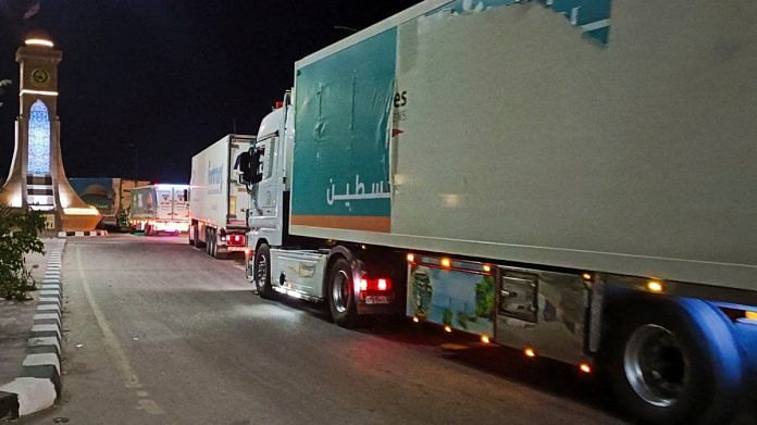 A convoy of trucks carrying humanitarian aid from Egyptian NGOs for Palestinians start to move from Al-Arish to Rafah city as they wait for an agreement on the opening on the Rafah border crossing to enter Gaza, amid the ongoing conflict between Israel and Hamas, in the city of Al-Arish, Sinai peninsula, Egypt | Reuters