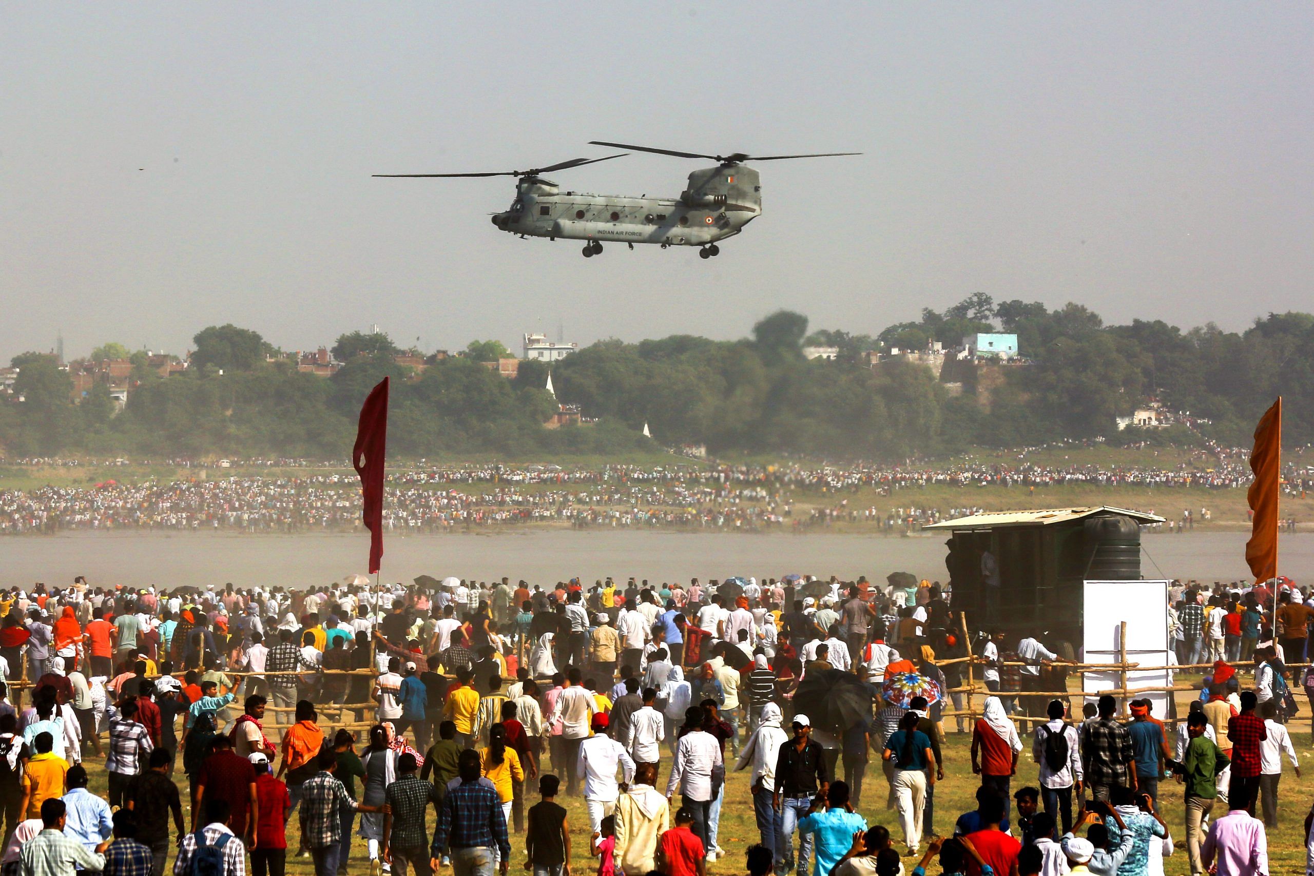 IAF’s Chinook helicopter flies over Prayagraj as a sea of people watch in awe | Suraj Singh Bisht | ThePrint