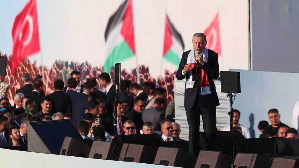 Turkish President Tayyip Erdoğan addressing rally in solidarity with Palestinians in Gaza, in Istanbul, Saturday | REUTERS/Dilara Senkaya