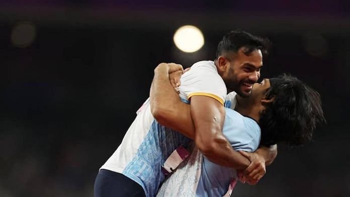 Neeraj Chopra (R) and Kishore Jena (L) at Asian Games 2023 | Reuters