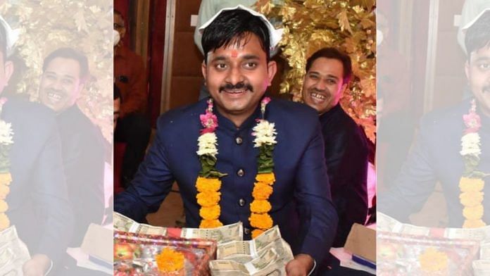 Shashank Mishra with his relatives and the tray of cash during one of the wedding ceremonies | By special arrangement