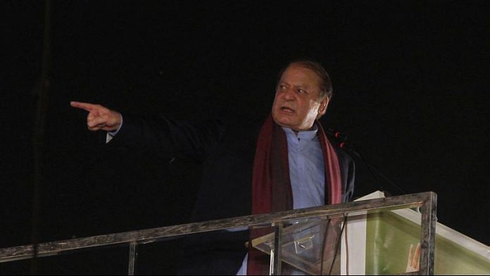 Pakistan's former PM Nawaz Sharif addresses supporters upon his arrival from a self-imposed exile in London, ahead of the 2024 Pakistani general election, in Lahore, on 21 October 2023 | Reuters