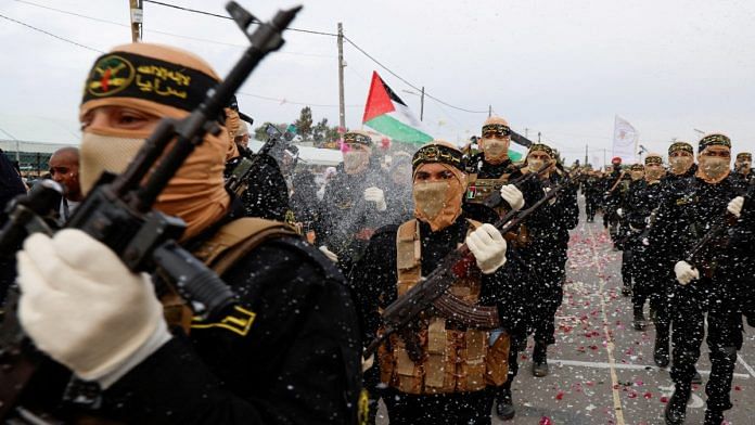 Palestinian Islamic Jihad militants during an anti-Israel military parade in Gaza City on 4 October, 2023 | REUTERS/Mohammed Salem