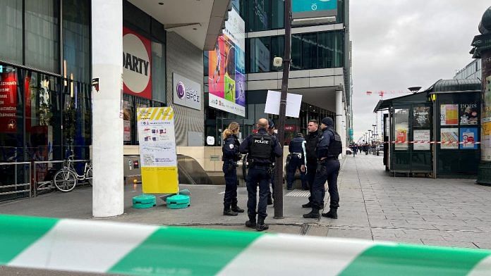 Police stand outside the Bibliotheque Francois Mitterand metro and regional train station in Paris, France, on 31 October 2023 | Reuters