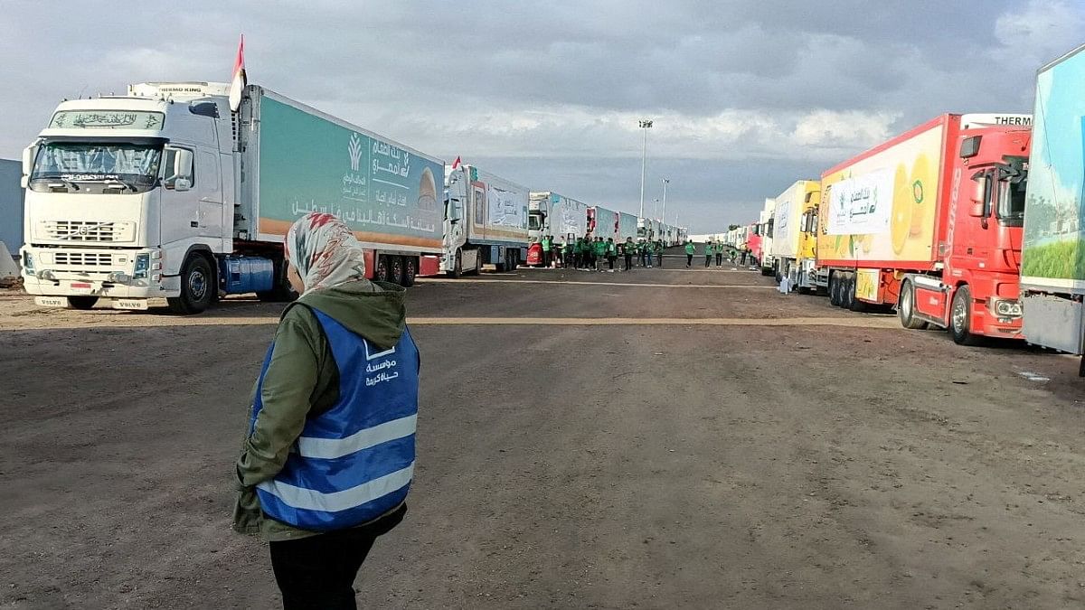 Trucks carrying aid from Egyptian NGOs for Palestinians wait for reopening of Rafah crossing at Egyptian side on 17 October, 2023 | REUTERS/Stringer