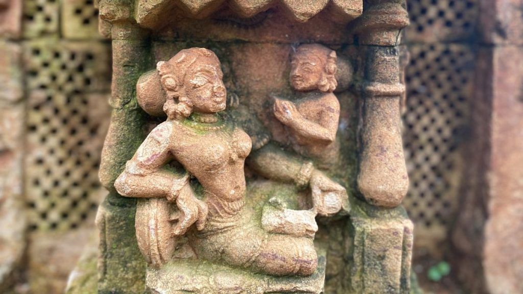 "A medieval Odia queen in her palace, with palm leaf manuscripts in her lap and an attendant receiving orders. From the Sukhasari temple complex in Bhubaneswar, c. 11th century CE | Photo: Anirudh Kanisetti