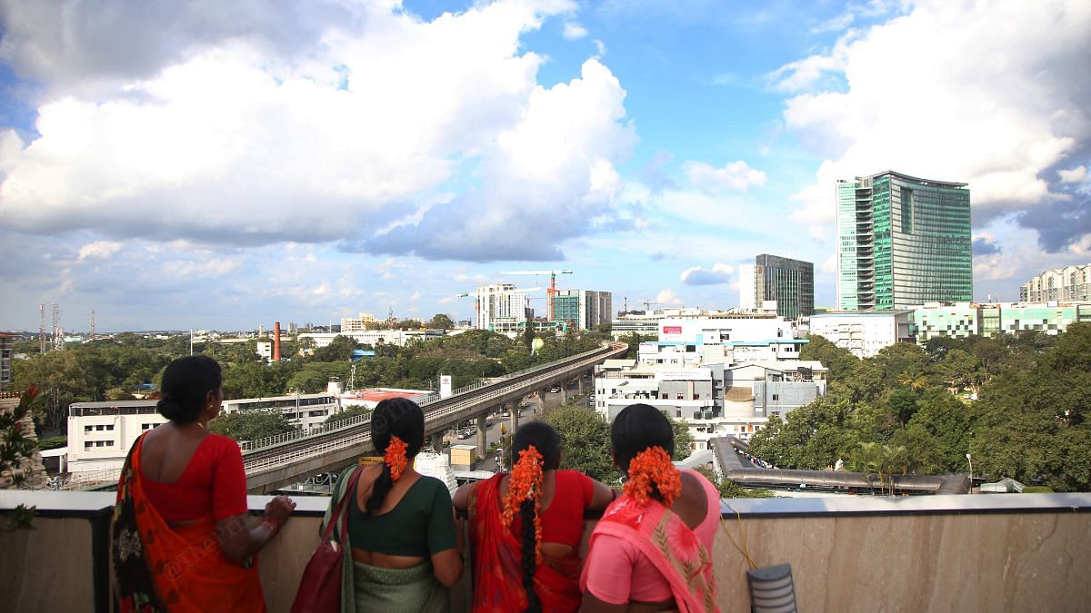 Women looking over skyscrapers in Bengaluru | Manisha Mondal, ThePrint