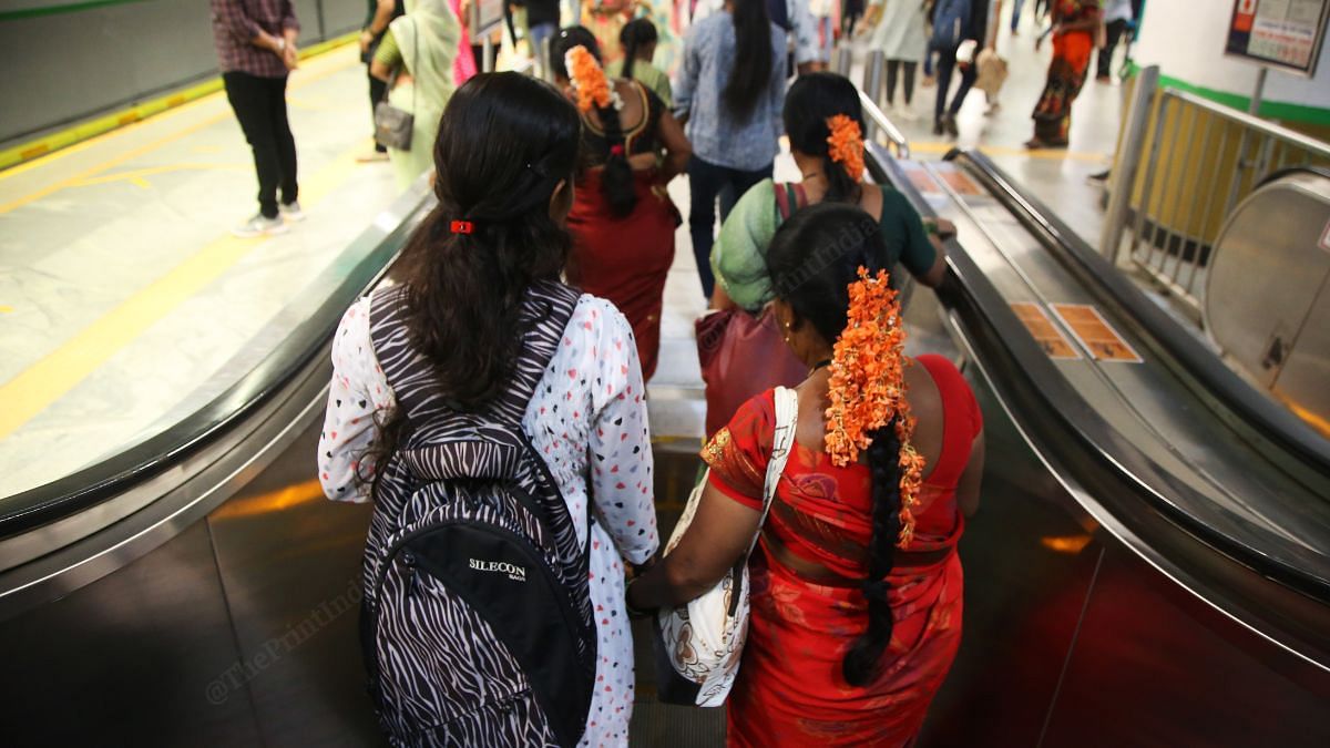 First time in Bengaluru, and first time using escalators, they held on to each other. Some of them chose stairs instead | Manisha Mondal, ThePrint