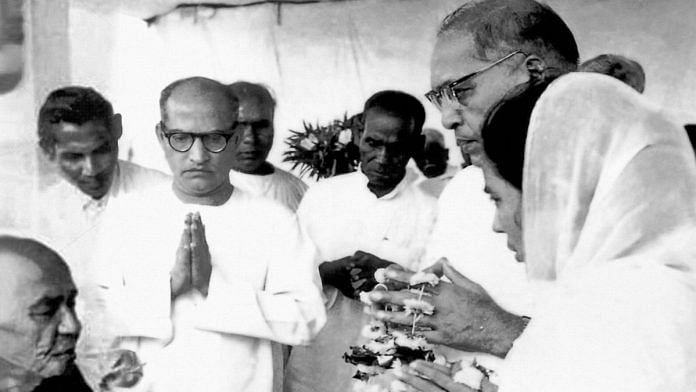 On 14 October 1956, in Nagpur, the Burmese monk Bhikkhu Chandramani (far left) initiated Ambedkar and his wife Savita into Buddhism. Devapriya Valisinha, the secretary of the Maha Bodhi Society, Kolkata, is next to Chandramani. Ambedkar then offered deeksha to around 400,000 people, administering the oaths of trisarana and panchasheel, and the twenty-two oaths drafted by him in Marathi | Pic credit: from Vijay Surwade's archive, courtesy Navayana.