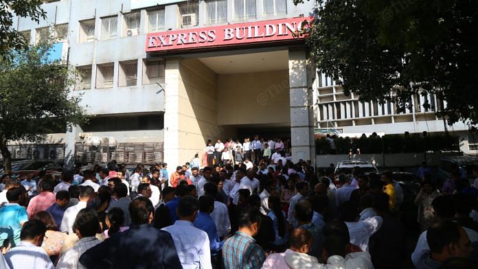 People gathered outside the Express Building in ITO after earthquake tremors were felt in Delhi-NCR region, on 3 October 2023 | ThePrint Photo by Suraj Singh Bisht