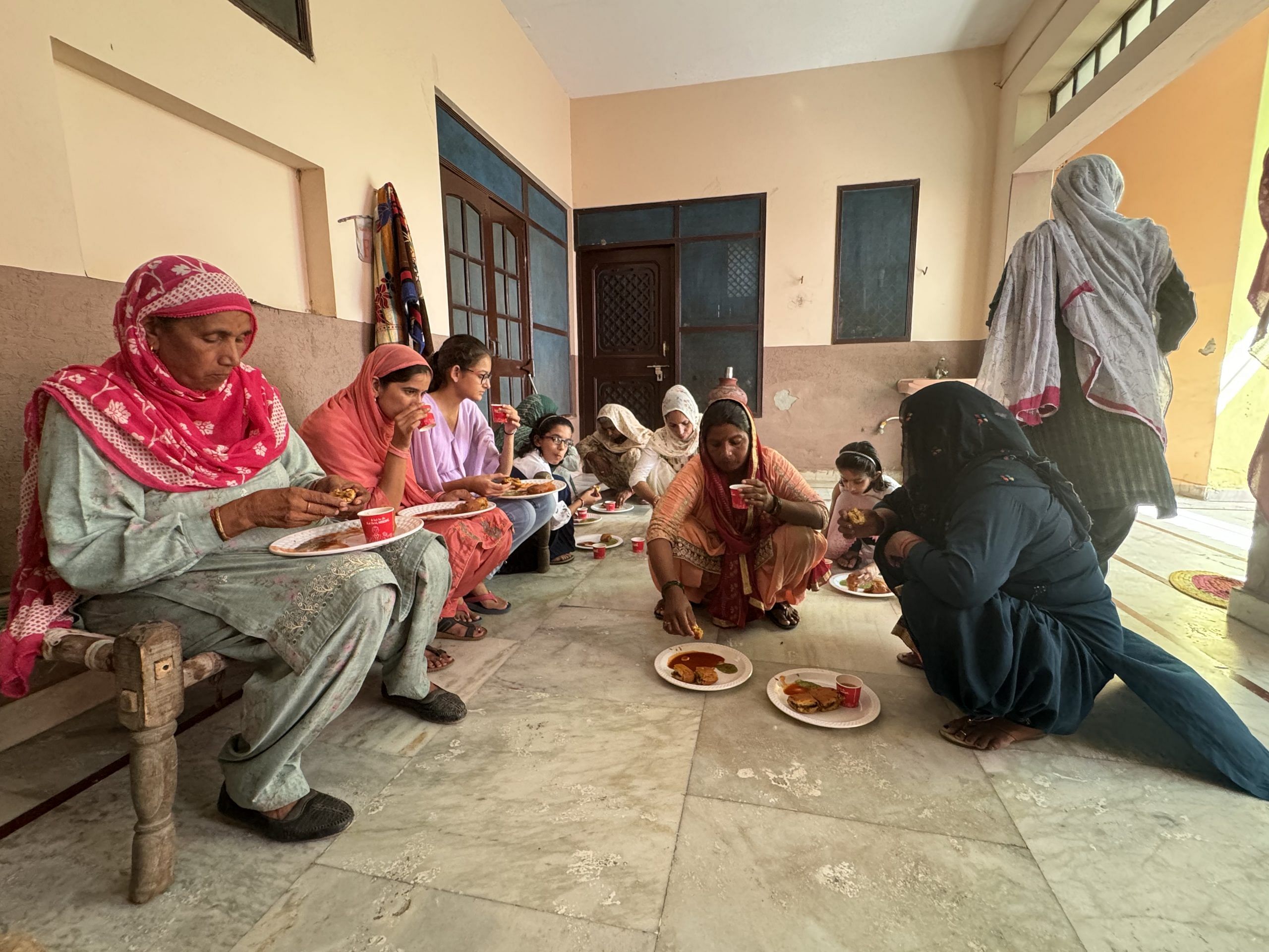 Women gather for a meal after the mahila panchayat. They discuss what Doohan said while they eat | Sagrika Kissu | ThePrint