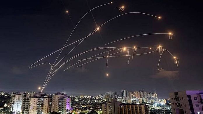 Israel's Iron Dome anti-missile system intercepts rockets launched from the Gaza Strip | Reuters