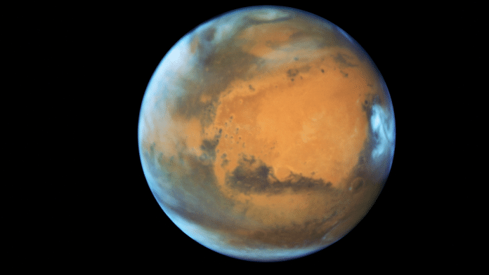 File photo of the planet Mars shown in the NASA Hubble Space Telescope view taken on May 12, 2016 | NASA/Handout via Reuters