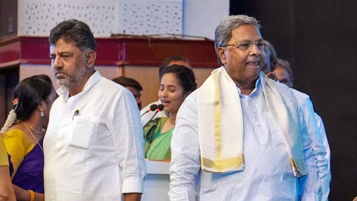 FIle photo of Karnataka CM Siddaramaiah (right) with deputy CM D.K. Shivakumar at an event in Bengaluru | PTI