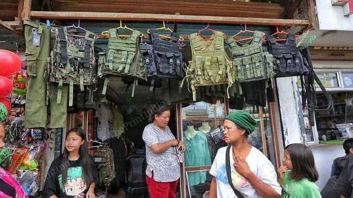 One of many local shops in Churachandpur, Manipur, offering an array of 'military' items, including tactical vests and combat fatigues | Photo: Praveen Jain | ThePrint