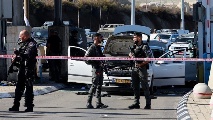 Israeli security personnel stand guard in the aftermath of a violent incident in Jerusalem | Reuters