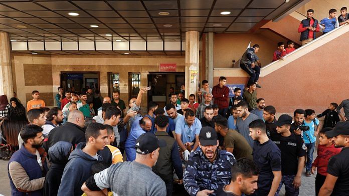 Palestinians wounded in an Israeli strike are rushed into Nasser hospital, amid the ongoing conflict between Israel and Palestinian Islamist group Hamas, in Khan Younis in the southern Gaza Strip | Reuters